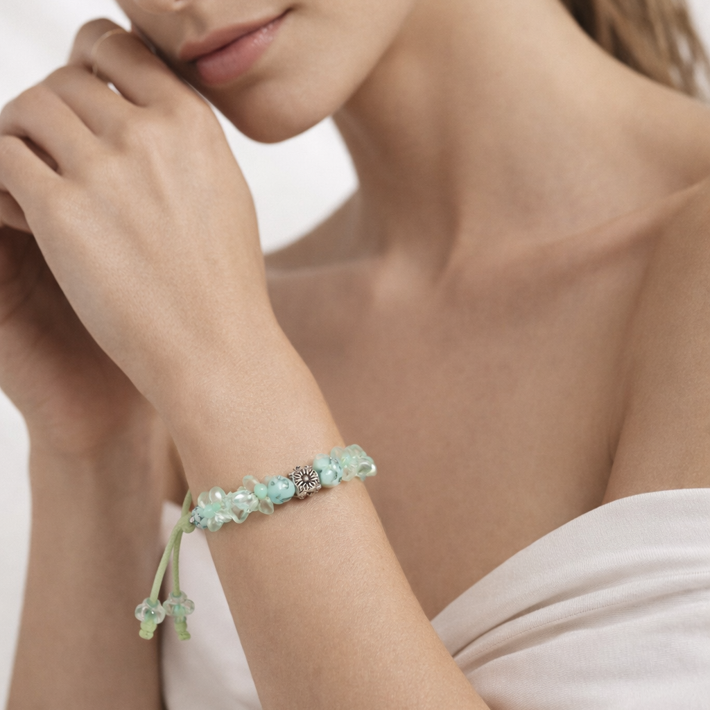 Green rope bracelet with turquoise beads.