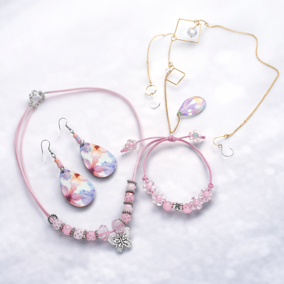 Gift set includes, earrings, bracelet, necklace and sun catcher.