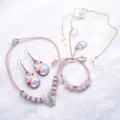 Gift set includes, earrings, bracelet, necklace and sun catcher.