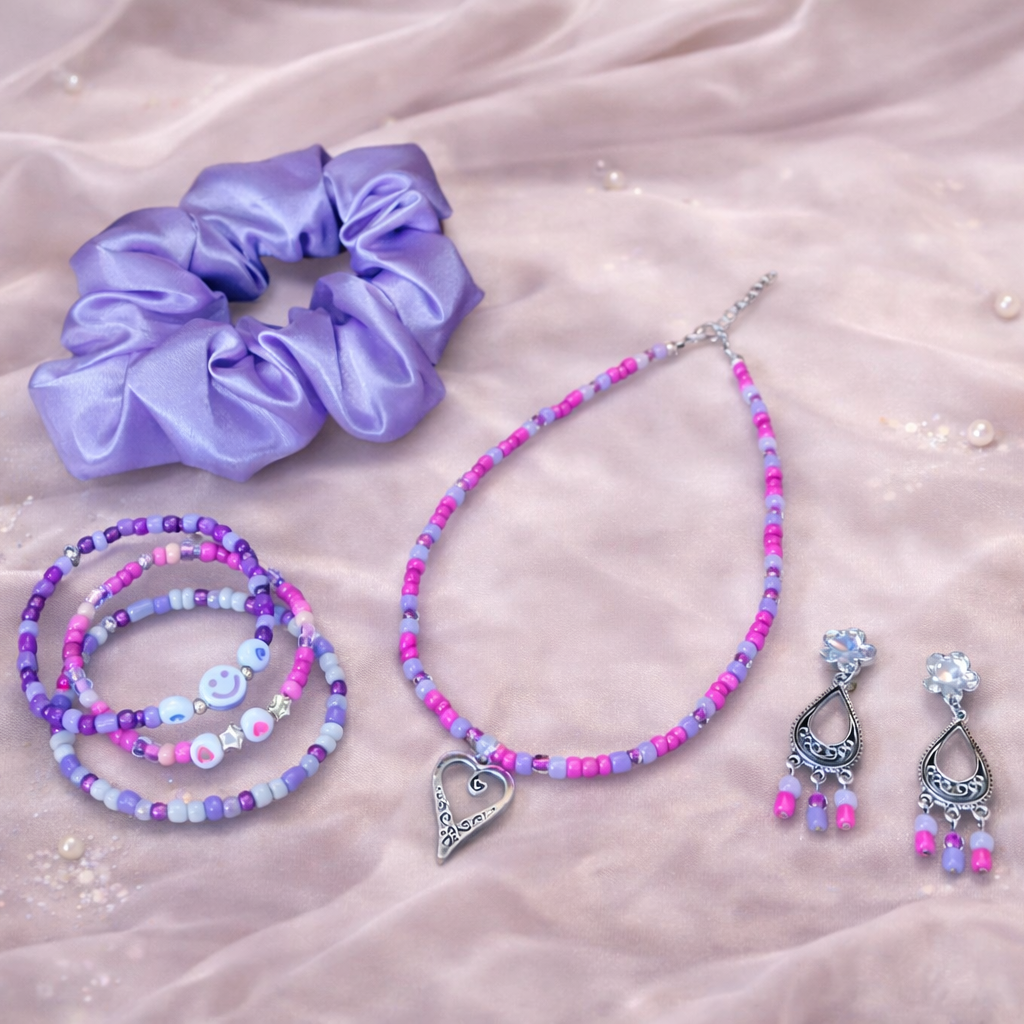 The Serene Purple Haze gift set for women featuring purple bead necklace, matching three bracelets, dangling earrings and satin hair scrunchie. Gift bag.