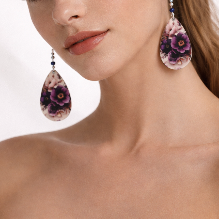 Dangling purple flower earrings.
