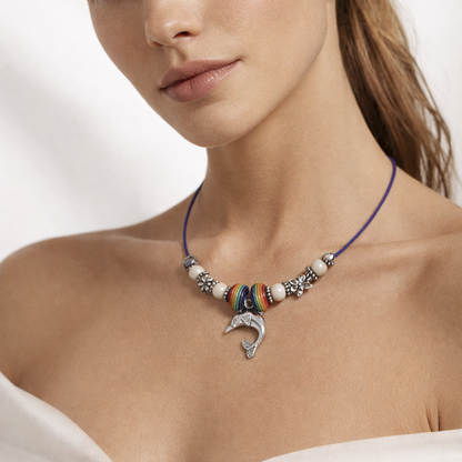 Purple rope bead necklace with dolphin pendant.