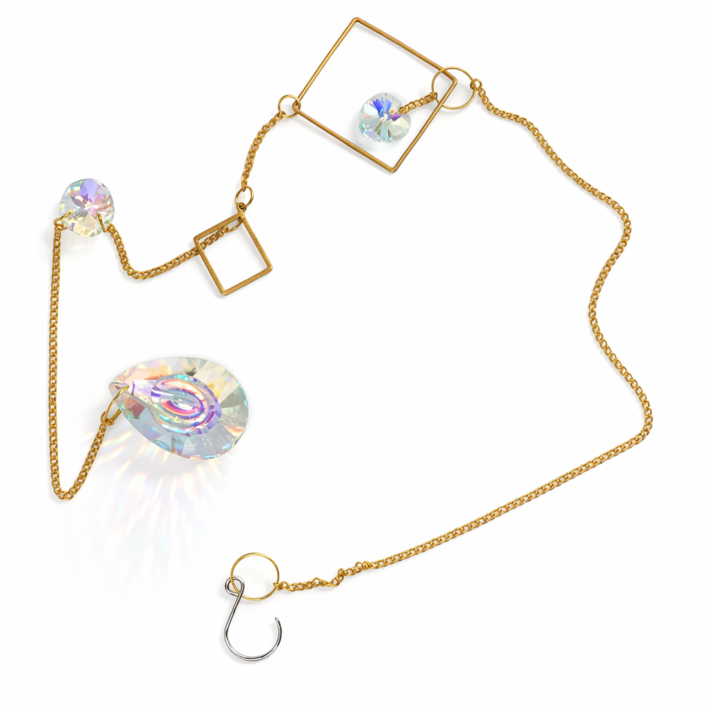 Gold sun catcher with glass diamonds.