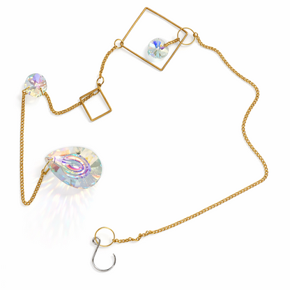 Gold sun catcher with glass diamonds.