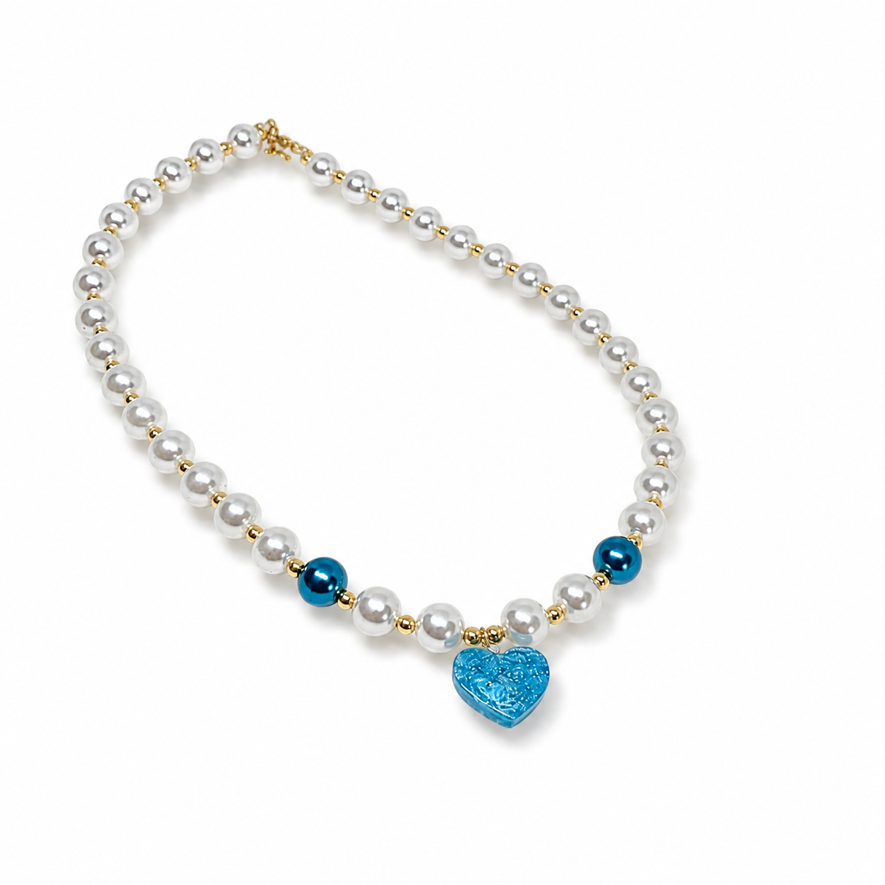 White pearl necklace with blue beads and blue resin heart