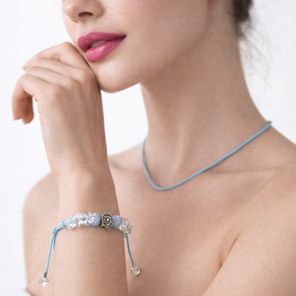 Light blue cord bracelet with beads