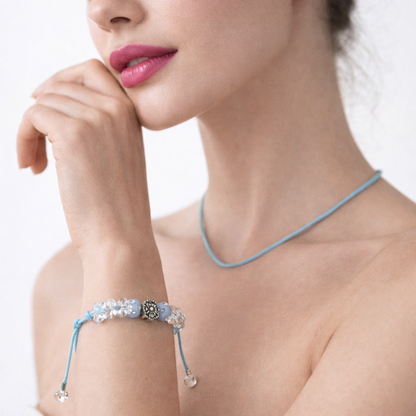 Light blue cord bracelet with beads