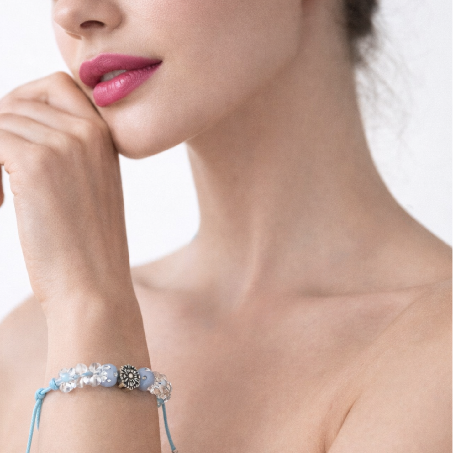 Light blue cord bracelet with beads