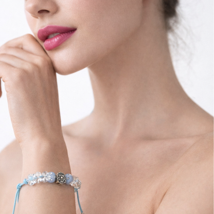 Light blue cord bracelet with beads