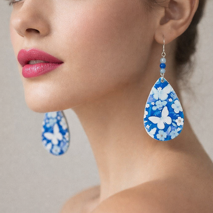Blue flower dangling earrings