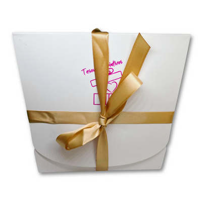 White gift box with a gold ribbon