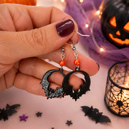 Halloween-themed black bat earrings