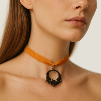Halloween-themed orange choker with black bat pendant.