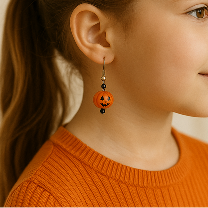 Halloween-themed children's pumpkin earrings.