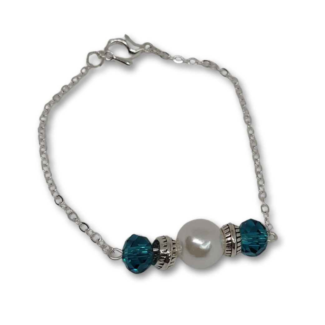 Jewelry gift for women featuring Clear Blue Beaded bracelet with pearl ornament and silver chain