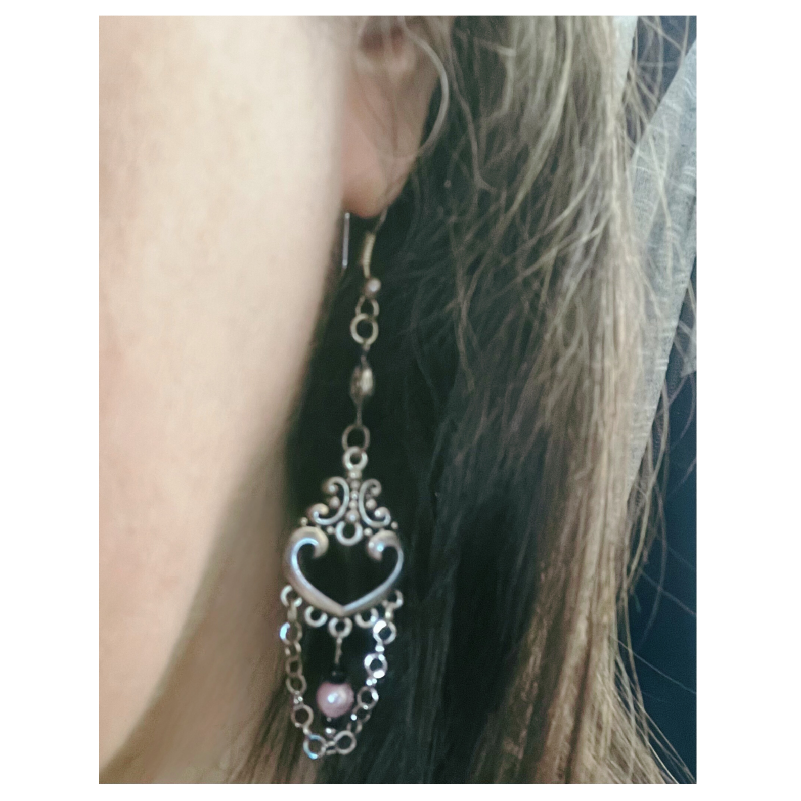 Dangling old fashion style earrings.