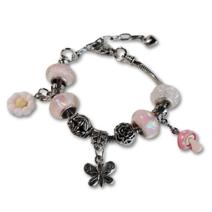 Pink charm bracelet.