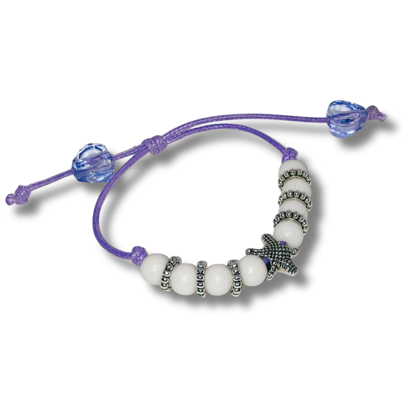 Bracelet with white beads and purple cord 