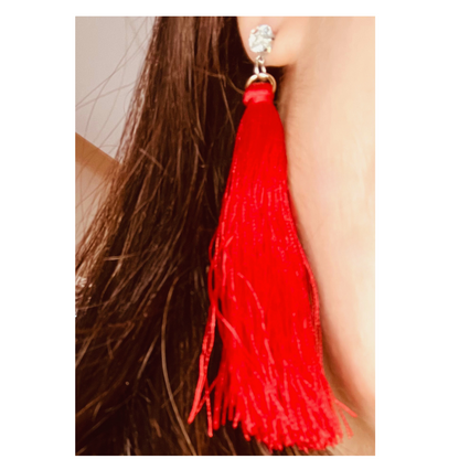 Red tassle earrings.