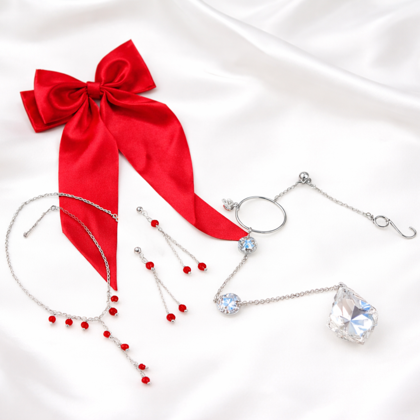 Radiant Red gift set includes necklace, matching earrings, sun-catcher, satin red bow for hair. Packaged in a red gift bag. 