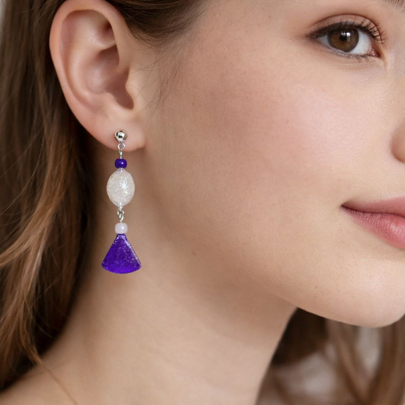 Resin purple and white beaded earring.