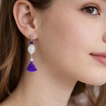 Resin purple and white beaded earring.