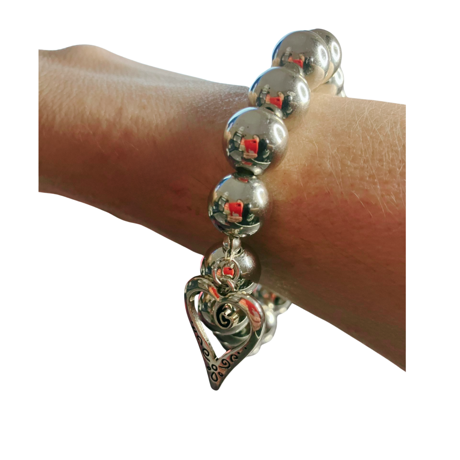 Silver bracelet with silver beads and heart charm 