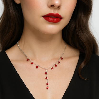 Silver necklace with red beads