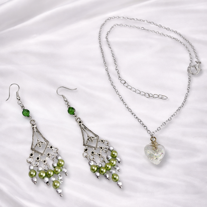 Dangling green and silver earrings and silver necklace with heart pendant