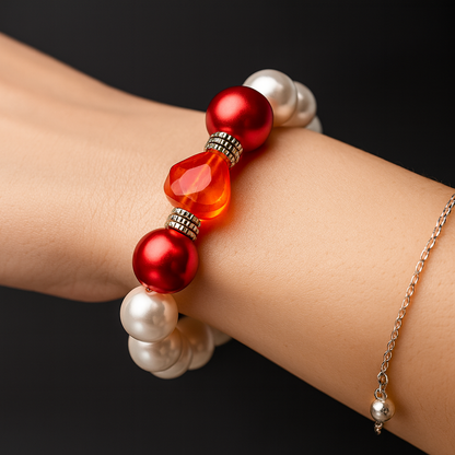 Bracelet with white and red pearls and heart.