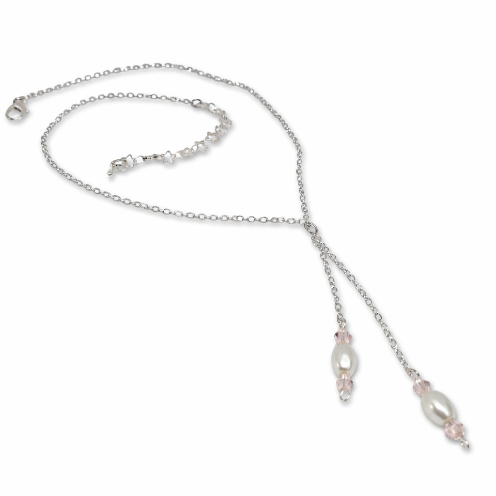 Silver necklace with imitation white pearls and pink glass beads.