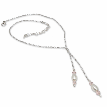 Silver necklace with imitation white pearls and pink glass beads.