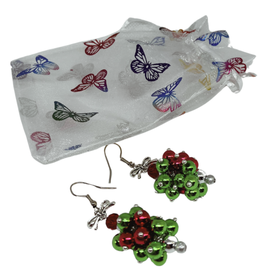 Earrings for Christmas with red and green shiny beads decorated with silver beads, gifted in a white butterfly organza gift bag.